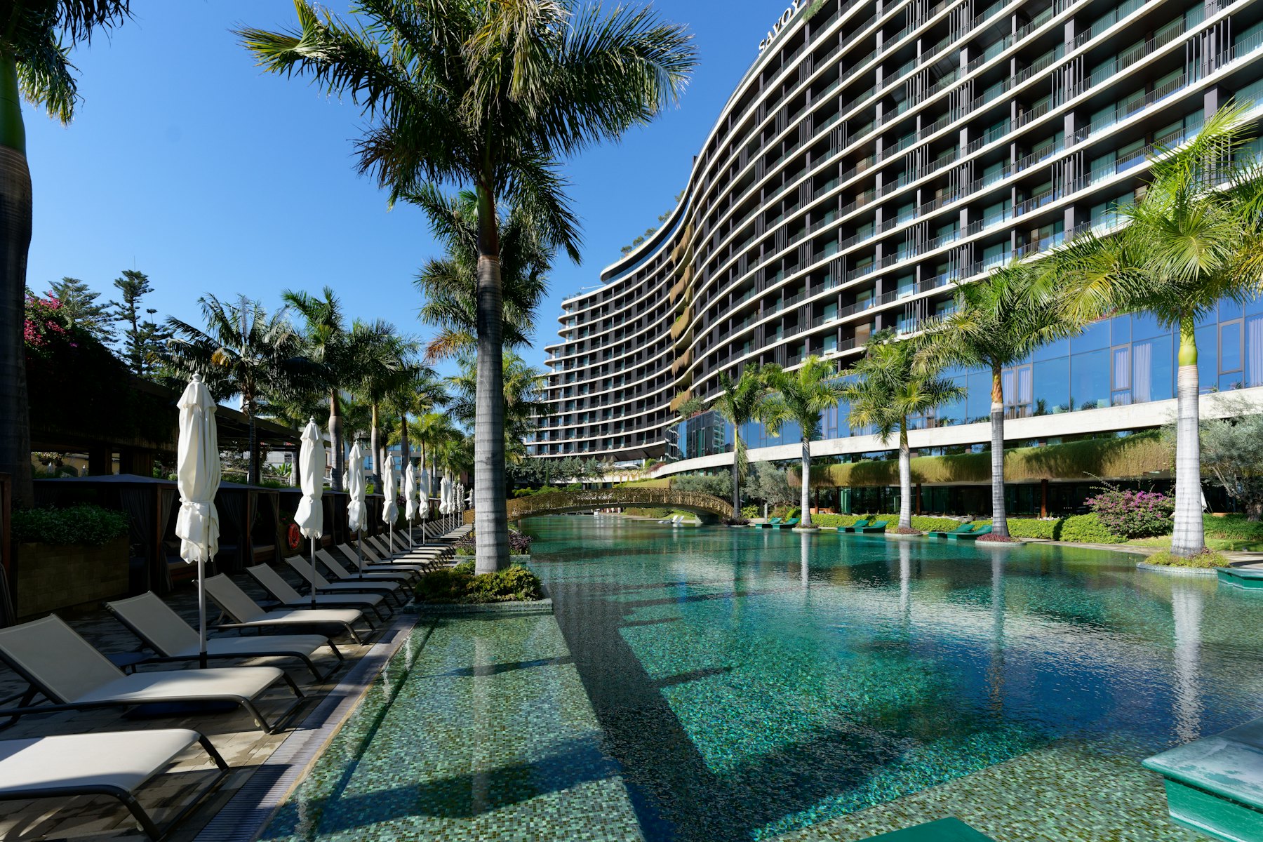 Full-service hotel exterior at dusk